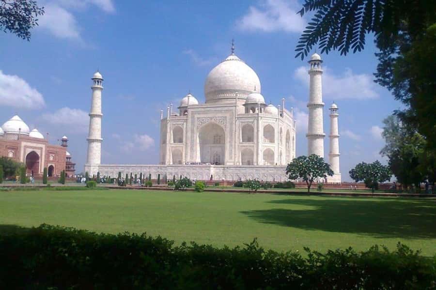 Agra: Taj Mahal Guided Tour with Fast Track Entry - Included items and what might affect the total cost