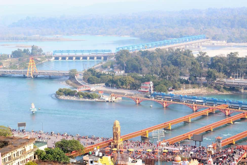 Amazing Same Day Haridwar and Rishikesh Tour From Delhi - Rishikesh at midday: Laxman Jhula, Ram Jhula, and river views