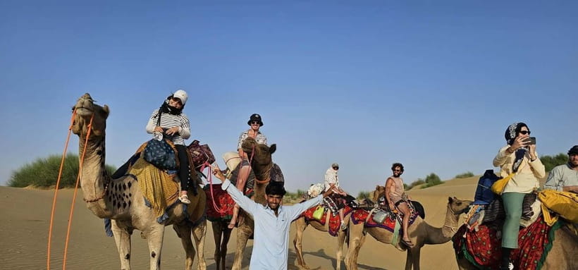 Blissful Half Day Sunset Camel Safari with Musical Evening - Practical packing for night desert air and strong daytime sun