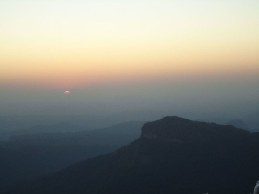 Darjeeling: Private Tiger Hill Sunrise Trip - Tiger Hill sunrise: Kangchenjunga, cotton clouds, and the reality of mist